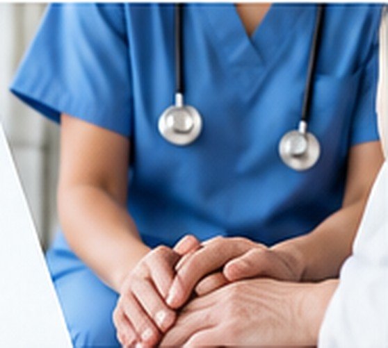 Nurse Practitioner supporting a patient at the bedside